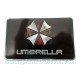 Sticker umbrella corporation logo rectangle fond noir badge 3d métal used